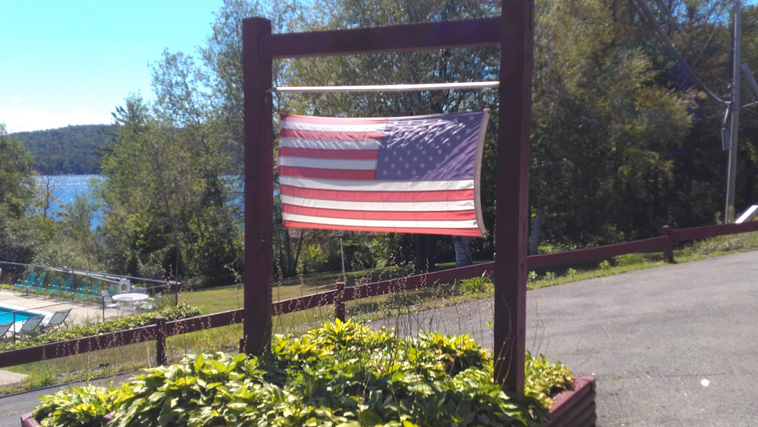 American flag flying at entrance
