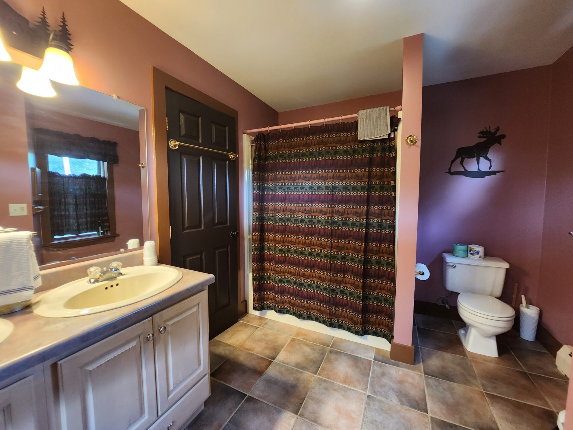 large bathroom with vanity and shower stall