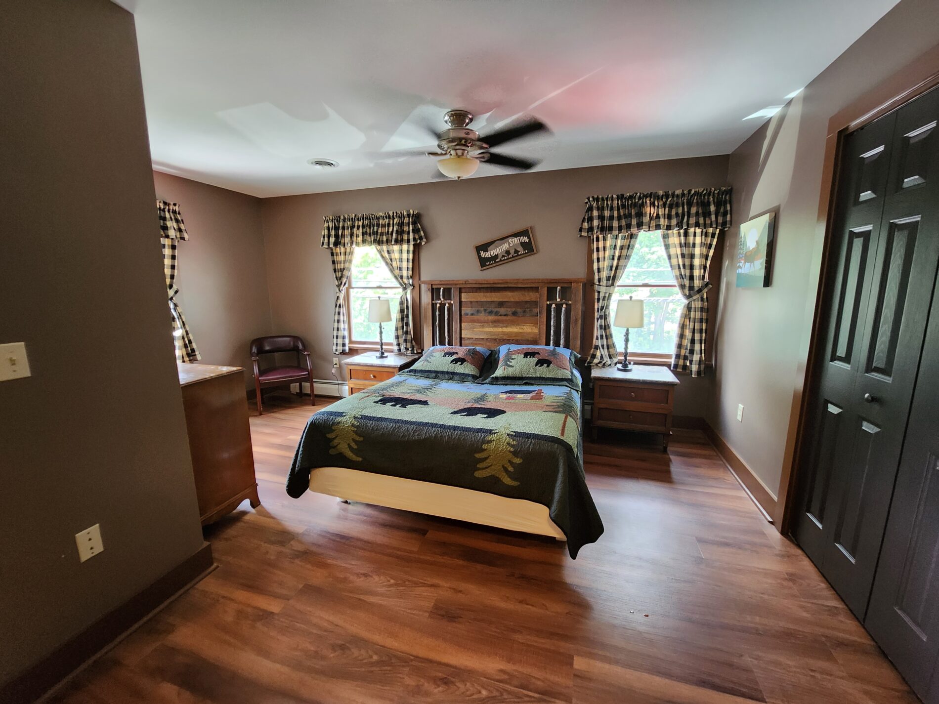 view of bedroom with end tables and chair