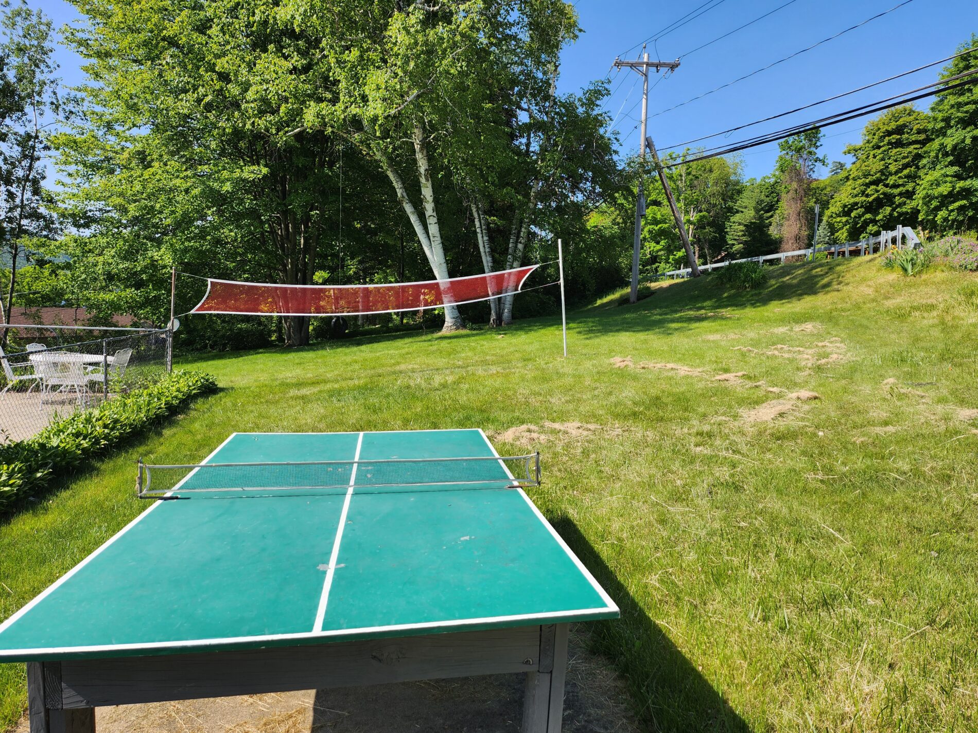 Ping pong table and volleyball net at Cramer's Point Lake Breeze resort in Lake George NY